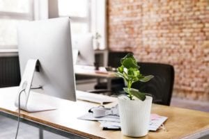 workspace with brick wall in office royalty free image 909223304 1566845696